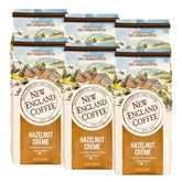 New England Coffee frente del paquete mostrando marca y tamaño 11oz, ideal para uso doméstico