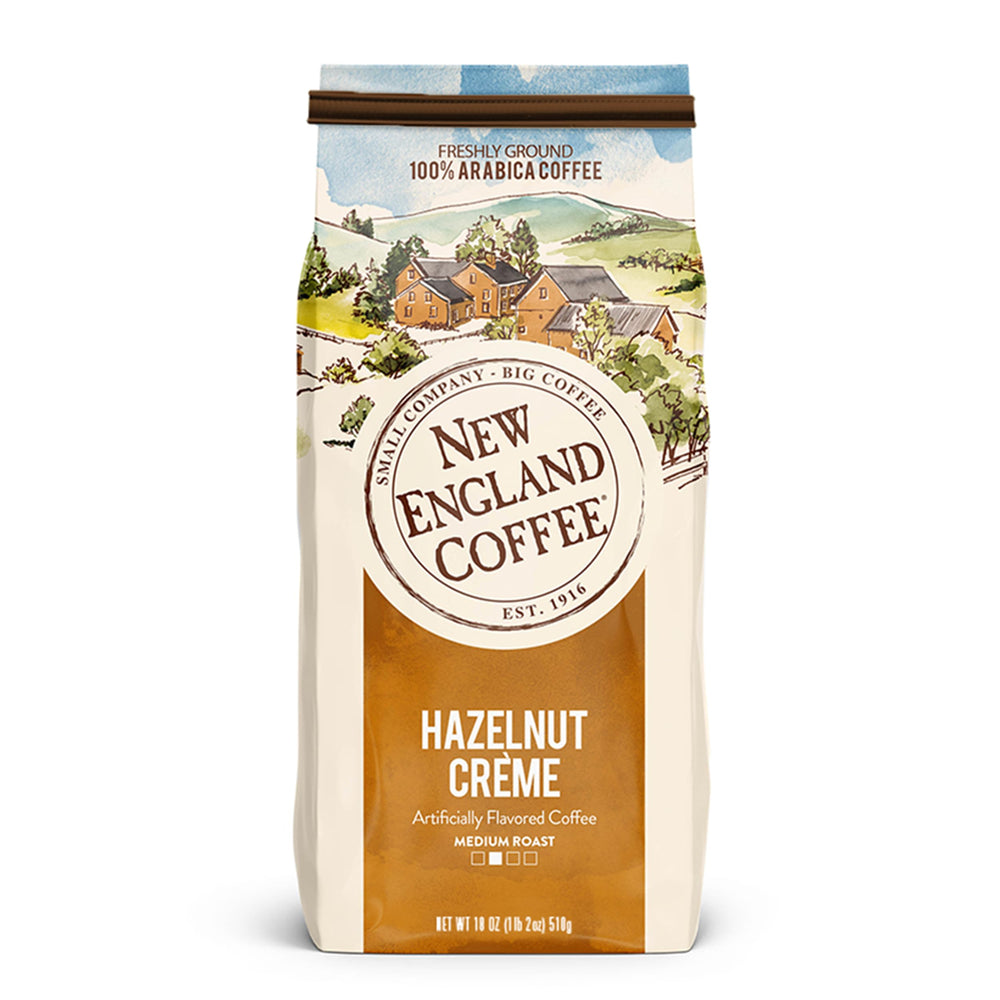 New England Coffee paquete frontal mostrando 18 oz y sabor avellana