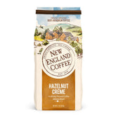 New England Coffee lata frontal mostrando diseño y nombre, excelente para identificar sabor