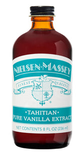Nielsen-Massey botella frontal mostrando etiqueta y beneficio aromático