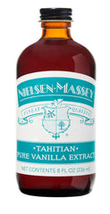 Nielsen-Massey botella frontal mostrando etiqueta y beneficio aromático