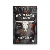 No Mans Land frente del paquete mostrando la marca y tamaño 7.5oz, ideal para viajes
