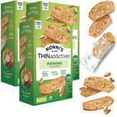 Nonni's caja frontal de Thin Addictives Pistachio Almond Thins con diseño y peso