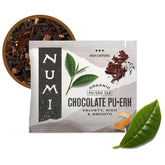 Numi frente del empaque mostrando 100 filtros y diseño compostable beneficios ecológicos