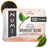 Numi embalaje frontal mostrando 100 sobres y beneficios sostenibles