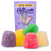 Nuts.com empaque frontal de Spice Drops muestra 40 oz y colores llamativos, práctico para compartir