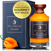 Oliveum botella frontal mostrando diseño de lujo y atractivo visual