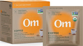 OM MUSHROOM SUPERFOOD frente del paquete mostrando sobres y beneficios