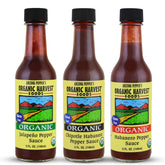 Organic Harvest pack frontal mostrando las tres botellas y variedad de sabores