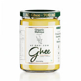 Organic Mandya frasco frontal mostrando ghee dorado y etiqueta clara