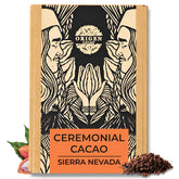 Origen Cacao empaque frontal mostrando el sello ceremonial y aporte de origen