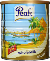 Peak envase frontal 2500 g mostrando etiqueta y uso para preparar leche instantánea