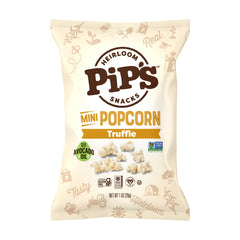 Pipcorn bolsa abierta en escritorio ilustrando snack práctico para oficina