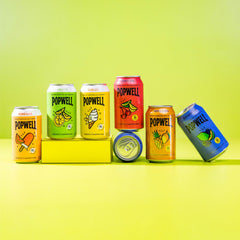 Popwell Tropical Mango etiqueta con información de fibra y vitaminas clara