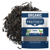 Organic Positively Tea empaque frontal mostrando bolsa de 16 oz y marca