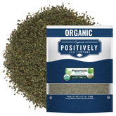 Organic Positively Tea Company empaque frontal mostrando hoja de menta y beneficio de pureza