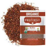Positively Tea paquete frente mostrando rooibos orgánico y beneficio de autenticidad