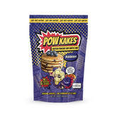 POWKAKES paquete frontal azul con imagen de pancakes y arándanos, conveniente para familias