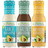 Primal Kitchen pack frontal con tres botellas, muestra variedad y conveniencia