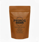 Primos Coffee Co. empaque frontal mostrando sellado y diseño, garantiza frescura