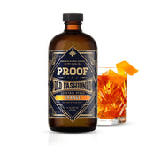 PROOF SYRUP botella frontal mostrando etiqueta naranja y beneficio de sabor artesanal