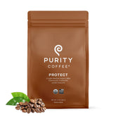 PURITY COFFEE paquete frontal mostrando diseño y peso, calidad orgánica visible