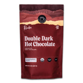Raaka empaque frontal mostrando mezcla doble dark y beneficios veganos