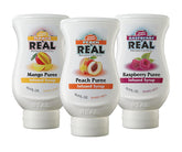 Reàl Infused Exotics pack frontal con botellas y colores de fruta, ideal para bebidas