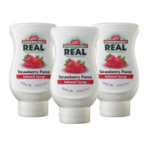 Reàl Infused Exotics vista frontal del pack de tres, práctico para bares