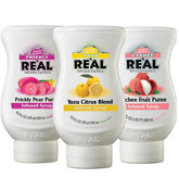 Reàl Infused Exotics pack frontal mostrando las tres botellas y colores llamativos