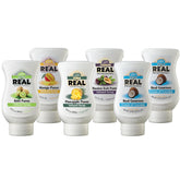 Reàl Infused Exotics paquete frontal mostrando seis botellas y colores vibrantes