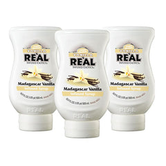 Reàl Infused Exotics vista frontal del pack de tres botellas, ideal para hostelería