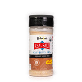 REDMOND empaque frontal de Real Salt Garlic Salt mostrando diseño y tamaño práctico