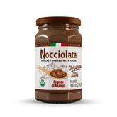 Rigoni di Asiago frasco frontal con etiqueta clara, producto orgánico visible