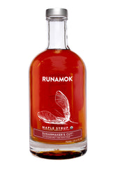 Runamok botella frontal 750 ml mostrando diseño y calidad