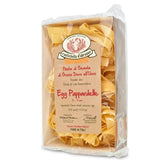 Rustichella d'Abruzzo paquete frontal mostrando pappardelle y beneficios artesanales
