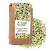 Sacred Blossom Farm paquete frontal mostrando Avena milky oats y origen Wisconsin