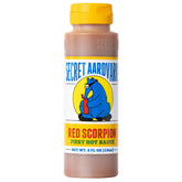Secret Aardvark botella frente mostrando diseño y atractivo en mesa