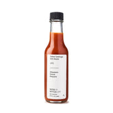 Señor Lechuga botella frontal mostrando diseño y promesa de sabor intenso