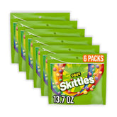 Skittles presentación frontal mostrando bolsas compartibles y colores llamativos