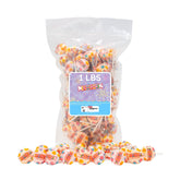 Smarties frasco delantero mostrando paletas coloridas y variedad de sabores