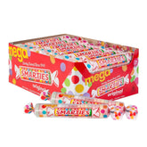 Smarties caja frontal mostrando rollos individuales y ventaja de surtido