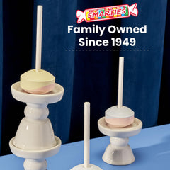 Smarties paleta en mano mostrando escala y tamaño práctico