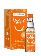 SodaStream bubly Drops Orange en uso con botella SodaStream, facilita bebidas caseras sin azúcar