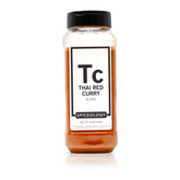 Spiceology curry rojo frente del envase mostrando etiqueta y peso beneficioso para cocinas