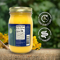 Spring Sunrise ghee frasco junto a una cuchara para comparar tamaño práctico