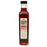 Sugar Bob’s botella al frente mostrando jarabe ahumado beneficios aromáticos
