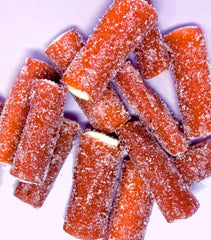 Sugarloo World porción en mano para comparar tamaño y facilidad de comer