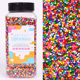 Sujoygar paquete frontal mostrando nonpareils multicolor que decoran postres