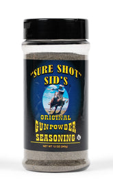 Sure Shot Sid's frasco frontal del adobo Gunpowder mostrando etiqueta clara y uso práctico